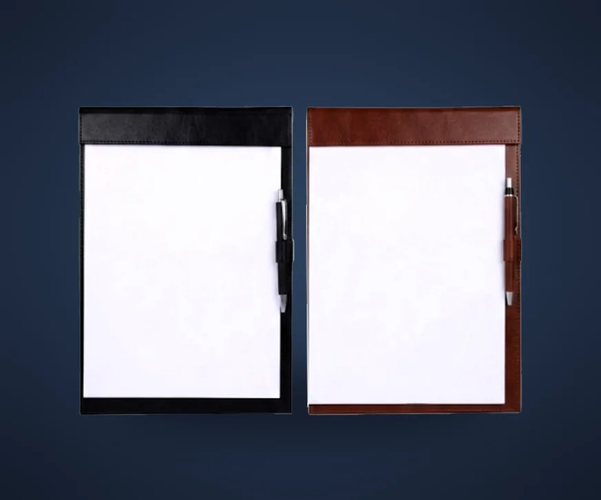 Black and brown leather writing pads